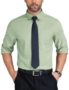 Green shirt worn with a navy tie for a stylish appearance