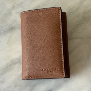 Coach handcrafted wallet with premium leather and elegant detailing