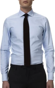 Light blue shirt with a black tie for a professional, stylish look