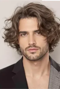 Medium length wavy hairstyle for men